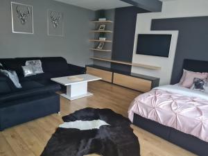 Łóżko lub łóżka w pokoju w obiekcie U Tatarów