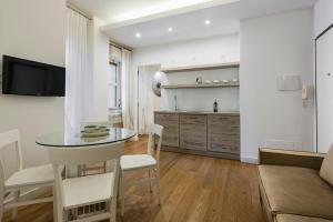 Kuchyňa alebo kuchynka v ubytovaní Ferrini Home - Suites