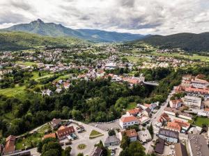 an aerial view of a small town in the mountains at Klečka vila B&B rooms in Ogulin