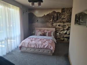 Łóżko lub łóżka w pokoju w obiekcie U Tatarów