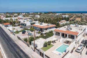 an aerial view of a house with a swimming pool at Anastasia Luxury House in Afantou