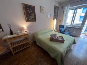 Postel nebo postele na pokoji v ubytování camera Santa Rita