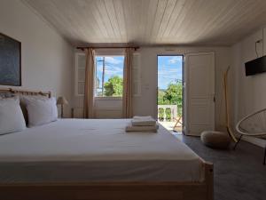 Voodi või voodid majutusasutuse ELENA APARTMENTS ITHACa toas