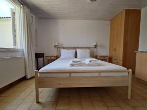 Voodi või voodid majutusasutuse ELENA APARTMENTS ITHACa toas