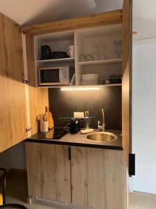 Kuchyň nebo kuchyňský kout v ubytování L'ATELIER 14 - Centre ville - Appartement entier- Neuf