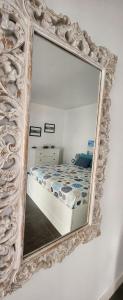 A bed or beds in a room at Beach Life