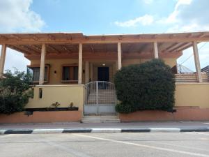 a house with a gate in front of it at Mool Gilboa - מול גלבוע in Bet Sheʼan