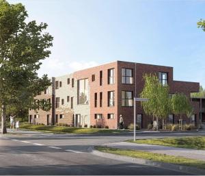 エムデンにあるNeues Apartment Nordisch bei Nature by Fewo & Zimmer Brunsの通り沿いにある建物