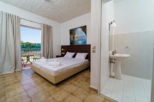 Postel nebo postele na pokoji v ubytování MaYo Rooms Zakynthos
