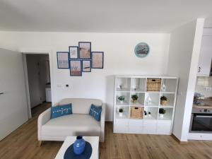 A kitchen or kitchenette at Apartman LALA