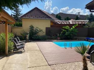 Πισίνα στο ή κοντά στο Veronika Lux Apartman