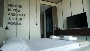 Postel nebo postele na pokoji v ubytování Hotel Nobilis Hall