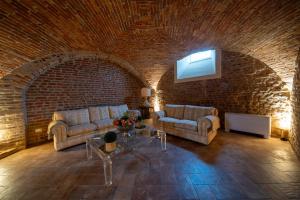 Posezení v ubytování Cascina Baronina