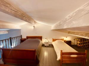 Llit o llits en una habitació de Gite CATHARE en OCCITANIE