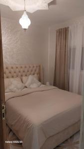 Rúm í herbergi á S&R Appartements
