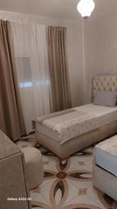 Rúm í herbergi á S&R Appartements