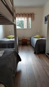 Postel nebo postele na pokoji v ubytování Hostel Tikka