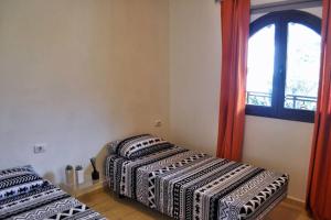 Ένα ή περισσότερα κρεβάτια σε δωμάτιο στο Bel appartement calme vue mer et montagne +14 φωτογραφίες