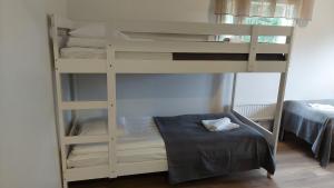 Postel nebo postele na pokoji v ubytování Hostel Tikka