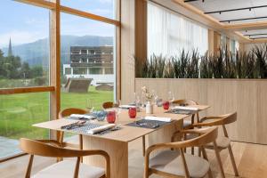 A restaurant or other place to eat at Falkensteiner Hotel & Spa Carinzia Superior