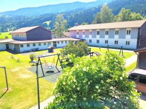 an aerial view of a school yard with a basketball hoop at Haus Denneberg in Oberstaufen
