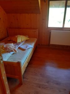 Postel nebo postele na pokoji v ubytování Pensiunea codru