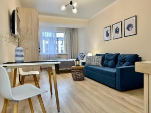 TV a/nebo společenská místnost v ubytování Студия КАНКУН с проектором в центре