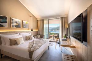 Телевизор и/или развлекательный центр в Valamar Tirena Hotel