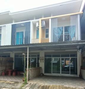 a house with a balcony on top of it at Freedom​ Hostel​ in Khao Lak