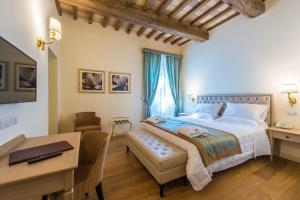 Postel nebo postele na pokoji v ubytování Relais Paradiso Resort & Spa