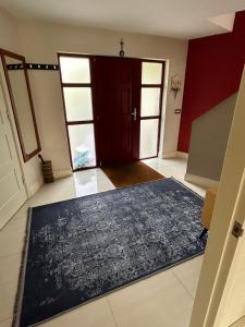 an empty room with a door and a black rug at Modern 4 Bedroom House Ring of Kerry -Killarney in Killarney