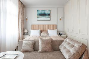 מיטה או מיטות בחדר ב-Hotel Balkan