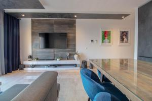 Area soggiorno di Geek Penthouse