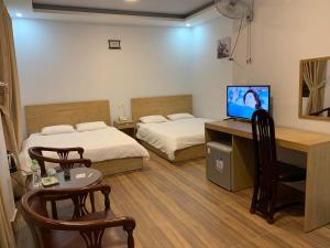TV a/nebo společenská místnost v ubytování Dang Nguyen Guesthouse