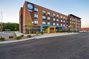 una representación de una tru por el edificio Hilton en Tru By Hilton Sterling Heights Detroit, en Sterling Heights