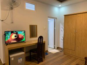 TV a/nebo společenská místnost v ubytování Dang Nguyen Guesthouse