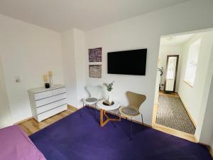 TV a/nebo společenská místnost v ubytování Appartement Seehof
