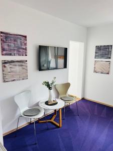 TV a/nebo společenská místnost v ubytování Appartement Seehof