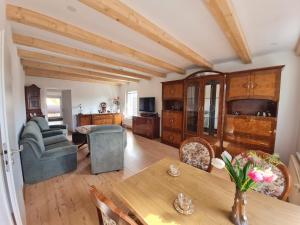 a living room with a table and a couch at Unit Sonnenschein in Schwerin