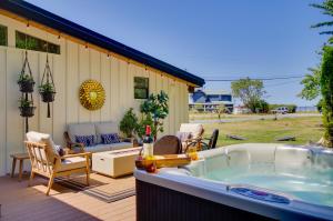 a hot tub on the deck of a house at Whidbey Island Oasis Walk to Beach, Hot Tub, View in Greenbank