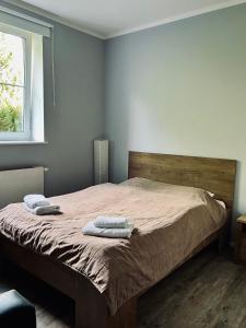 Postel nebo postele na pokoji v ubytování Motel Orzeł