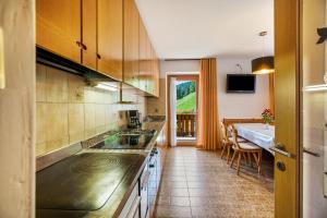 Cucina o angolo cottura di Bachwiesl Hof Apt Ocker