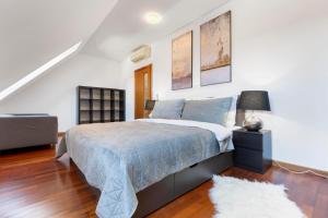 Posteľ alebo postele v izbe v ubytovaní Urban Elegance Retreat