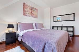 Posteľ alebo postele v izbe v ubytovaní Urban Elegance Retreat