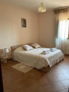 Ένα ή περισσότερα κρεβάτια σε δωμάτιο στο Alba Matesina