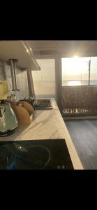 a room with a bed with a view of the ocean at The Lifeboat & Seaview Terrace in Skerries