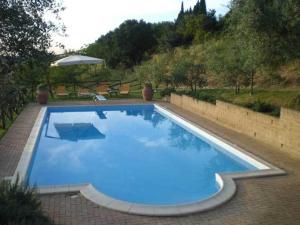 Bazén v ubytování Cortebella B&B Rimini nebo v jeho okolí