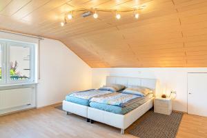 Ένα ή περισσότερα κρεβάτια σε δωμάτιο στο Hügelblick Oase