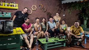 a group of people are posing for a picture at The Hood - Shkodra Backpackers Hostel in Shkodër
