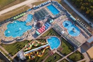 an overhead view of a water park with two pools at Apartman Pan in Soko Banja